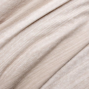 Soft beige Beryl blanket by Classic Home, cozy woven throw for living room or bedroom decor.