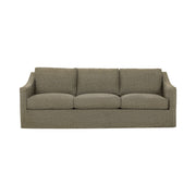 Classic Home Kipton upholstered stationary sofa with plush fabric, wide armrests, and comfortable seating in a modern living room setting.
