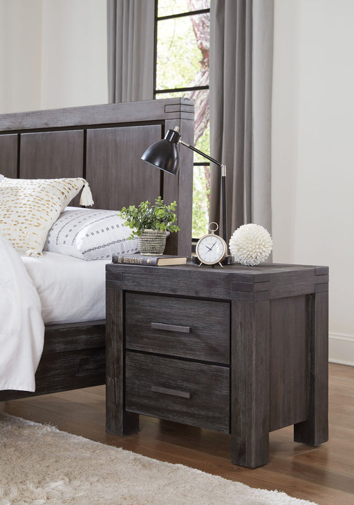Modus Meadow solid wood two-drawer nightstand in graphite with sleek design and modern hardware, standing on four sturdy legs.