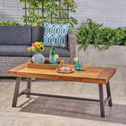 Noble House Carlisle industrial coffee table with natural finish and slat panel design, showcasing a sturdy wooden top and modern style.
