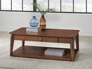 Medium brown rectangular cocktail table by Signature Design, featuring a sleek surface and sturdy wooden legs.