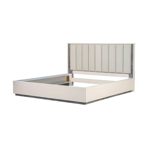 Upholstered bed by Michael Amini with integrated LED lights, featuring a plush headboard and modern design in a bedroom setting.