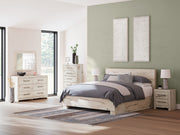 Signature Design by Ashley Lawroy storage panel bed with built-in drawers and modern wood finish.