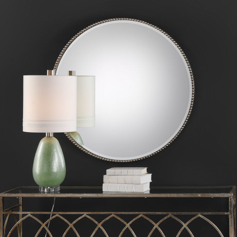 Uttermost Stefania beaded round wall mirror with pearl silver finish, featuring an intricate beaded frame design.