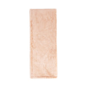 Classic Home Taiga throw blanket with textured fabric in neutral tones, perfect for cozying up on the sofa.