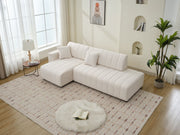 Urban Retreats Jessica lamb wool sectional sofa with chaise, showcasing plush seating and versatile configuration in a modern living room.