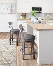 Caitbrook - UPH Swivel Barstool  - Gray - R&R Furniture Gallery (Fountain Valley, CA)