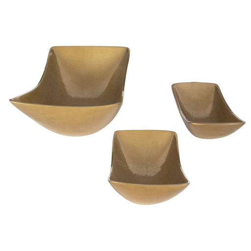 Set of three Anas antique brass bowls from Uttermost, featuring elegant curved design suitable for decorative or functional use.