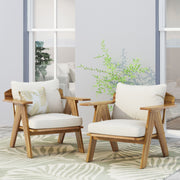 Set of two outdoor acacia wood club chairs with beige cushions by Noble House, featuring teak finish and comfortable armrests.