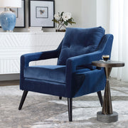 Uttermost O'Brien armchair with plush fabric upholstery and wooden legs, featuring a classic, comfortable design perfect for living rooms.