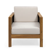 Outdoor 4-piece acacia wood chat set by Noble House with wicker accents and beige cushions, perfect for outdoor relaxation.