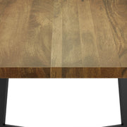 Simpli-Home Watkins sturdy dining table with wooden surface and tapered legs for a modern dining room setting.