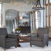 Uttermost Amiel arched wall mirror with ivory frame, decorative design, hanging on a wall, showcasing elegant home decor.