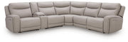 Benchcraft® Gravier reclining sectional sofa with plush cushions and reclining features, shown in a modern living room setting.