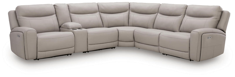 Benchcraft® Gravier reclining sectional sofa with plush cushions and reclining features, shown in a modern living room setting.