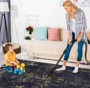 Maval - 8' X 10' Washable Area Rug - Black / Gold - R&R Furniture Gallery (Fountain Valley, CA)