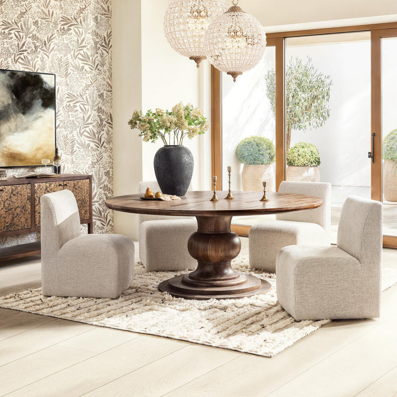 Classic Home Hera round dining table with wooden surface and sturdy base, ideal for modern dining rooms.