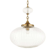 Uttermost Bellaire gold pendant light with a clear glass shade, modern pendant lighting for stylish interior decor.