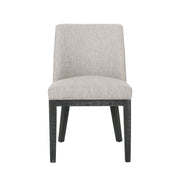 Set of two Noble House modern dining chairs with durable fabric upholstery and sturdy wooden frames, featuring sleek, contemporary design.