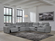Signature Design by Ashley Modmax II reclining sectional in salt and pepper fabric, showcasing plush cushions and reclining features.
