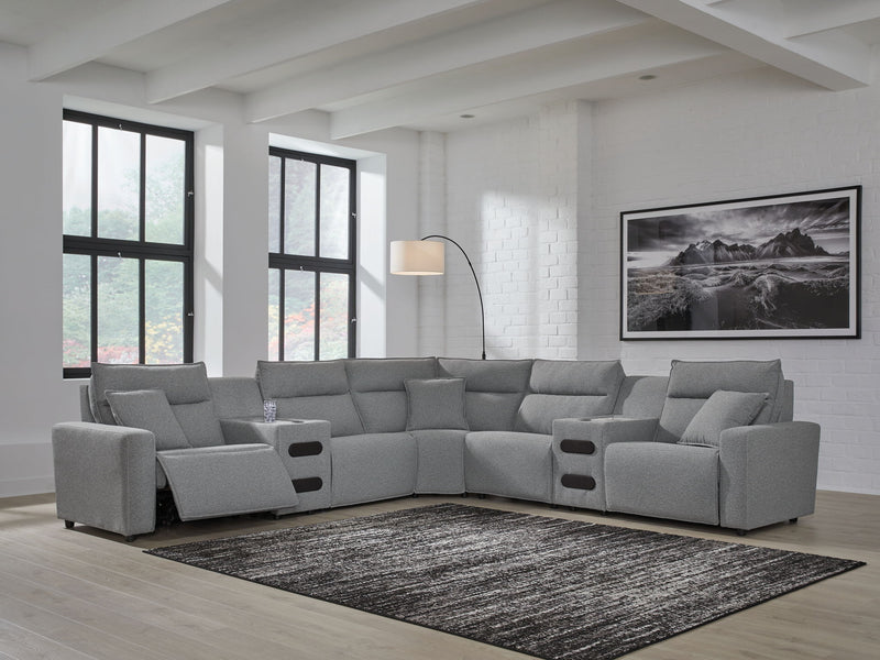 Signature Design by Ashley Modmax II reclining sectional in salt and pepper fabric, showcasing plush cushions and reclining features.
