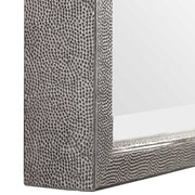 Silver metallic wall mirror by Uttermost with a sleek, round design and reflective surface.