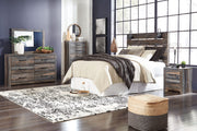 Signature Design by Ashley Drystan 5-piece bedroom set with a bed, dresser, mirror, and nightstands in a modern bedroom layout.
