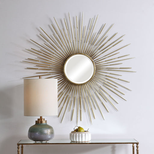 Golden Rays Starburst Mirror by Uttermost, gold wall mirror with a sunburst design and intricate starburst pattern.