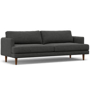 Livingston upholstered stationary sofa by Simpli-Home with plush fabric, wide armrests, and cushioned back for comfortable seating.