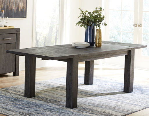 Modus Meadow solid wood rectangle table in graphite finish, showcasing a sturdy composite surface with a modern design.