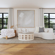 Classic Home Octavia stationary sectional sofa with plush cushions and modern design, shown in a spacious living room setting.