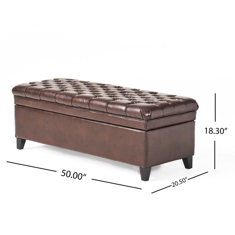 Noble House Juliana storage ottoman with birch wood legs, upholstered in soft fabric, serving as a stylish and functional storage piece.