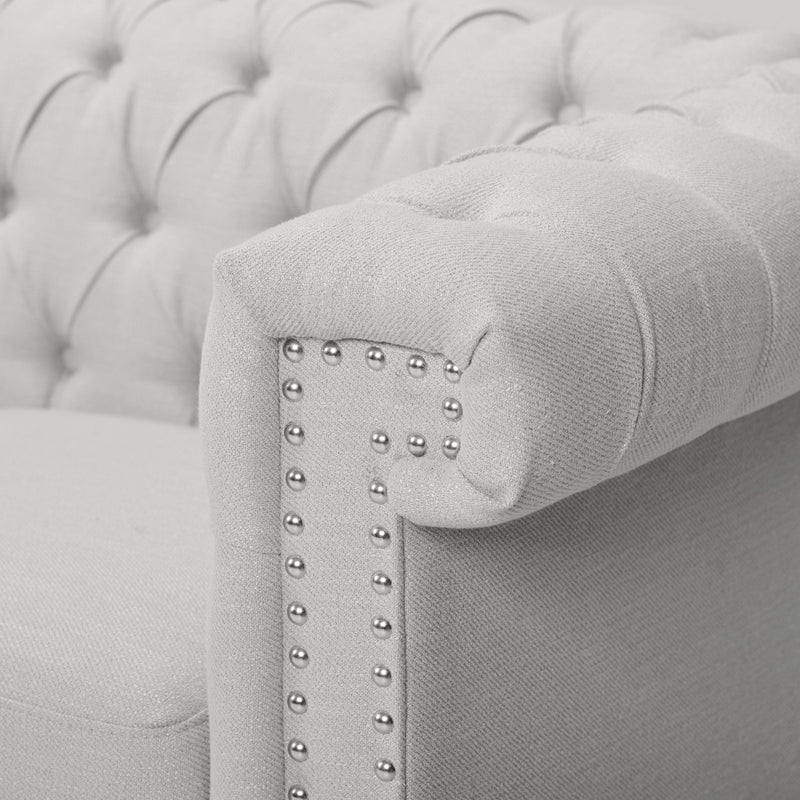 Noble House Chesterfield style 3-seater sofa with deep button tufting, featuring classic stationary design and plush upholstery.