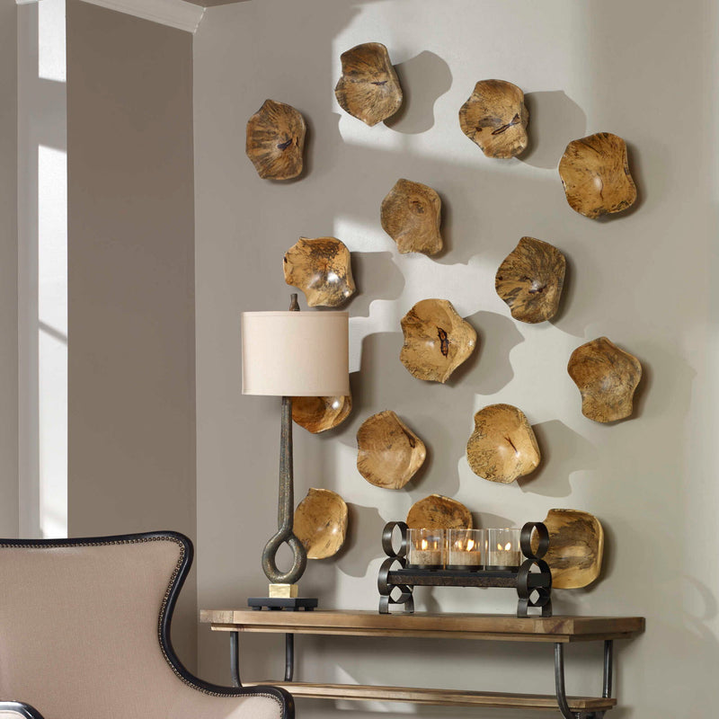 Set of three Tamarine wood wall art pieces by Uttermost in light brown, featuring textured, natural wood decor for wall decoration.