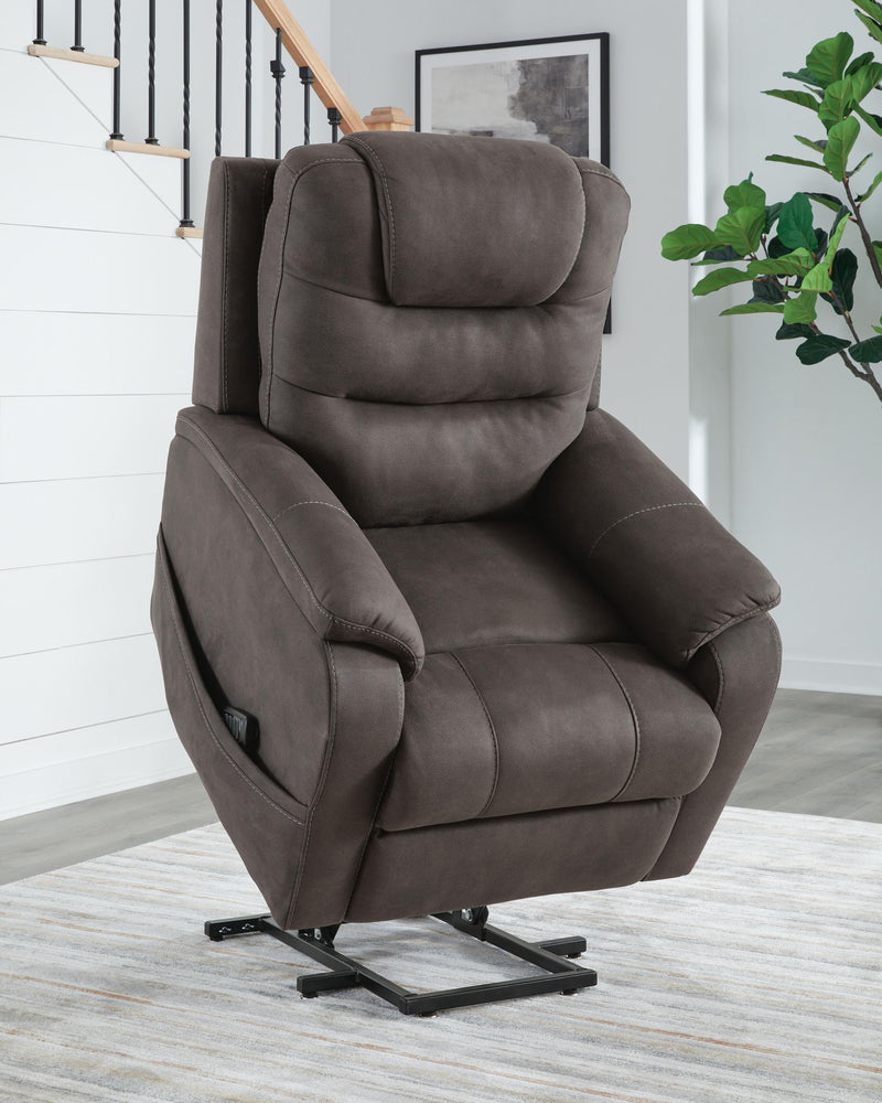 Gunmetal Power Lift Recliner from Snowfield by Signature Design Ashley, showing plush cushioning and adjustable reclining features.