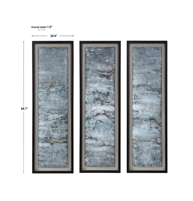 Set of three blue painted metal wall decor art pieces by Uttermost, featuring ocean-inspired wave designs for coastal interior decor.