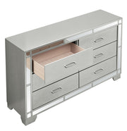 Silver champagne Madison dresser by Glory Furniture with sleek drawers and modern design, showcasing elegant bedroom storage.