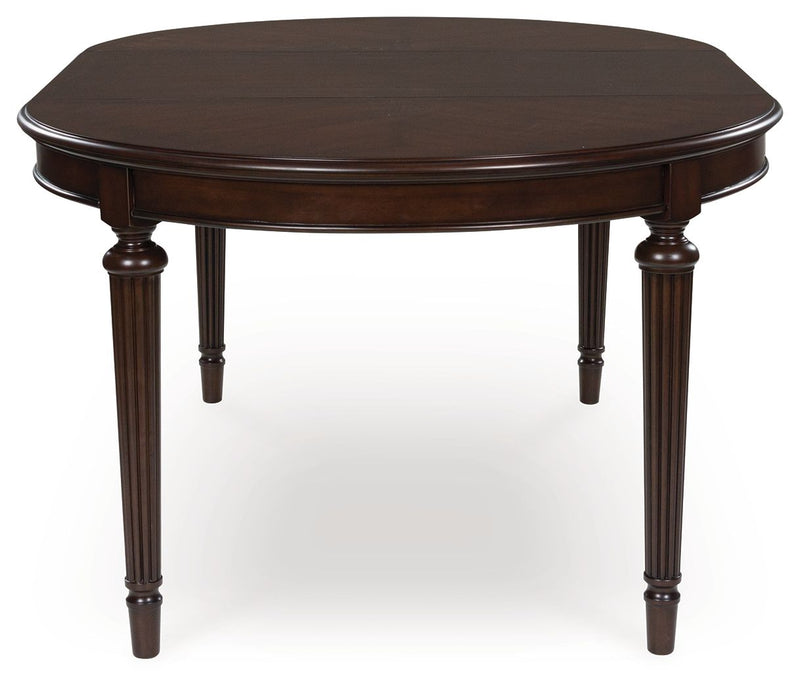 Lavinton - Oval Dining Room Extension Table - Brown - R&R Furniture Gallery (Fountain Valley, CA)