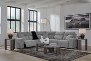 Signature Design by Ashley Modmax II reclining sectional in salt and pepper fabric, featuring plush cushions and reclining seats.