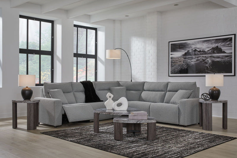 Signature Design by Ashley Modmax II reclining sectional in salt and pepper fabric, featuring plush cushions and reclining seats.