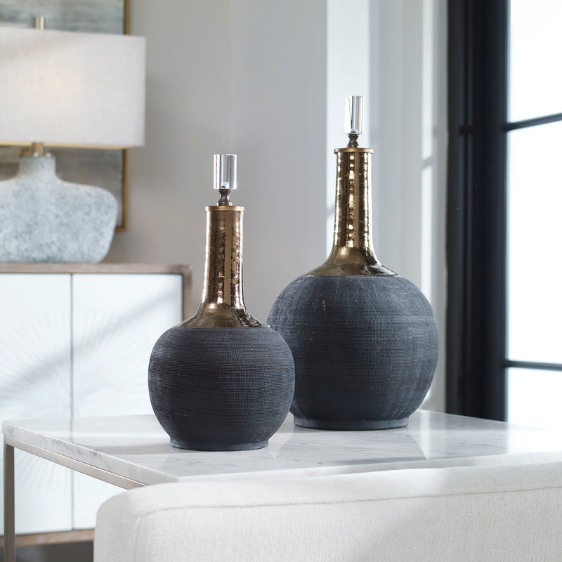 Pair of black matte vases from Uttermost's Arnav set, featuring sleek, modern design for decorative display.