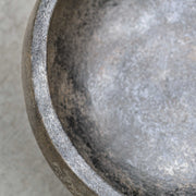 Uttermost Brixton bowl in aged black ceramic with a textured, matte finish, perfect for serving or decorative use.