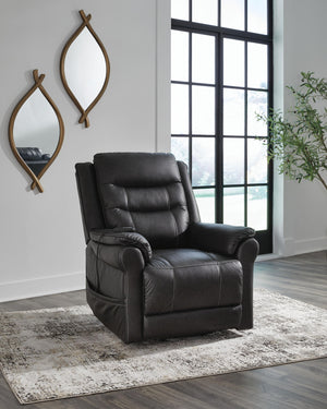Signature Design by Ashley Oatman Power Lift Recliner in soft fabric with padded armrests and reclining feature.