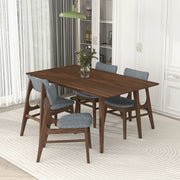 Modern rectangular dining table by Ashcroft Furniture, Mary model, with a sleek wooden surface and sturdy legs for kitchen or dining rooms.