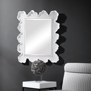 Uttermost Sea Coral wall mirror featuring a decorative coral-inspired frame with a natural, textured design.
