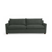 Olivia stationary sofa by Classic Home featuring plush fabric upholstery and a modern design in a cozy living room setting.