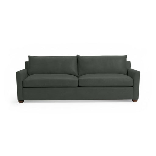 Olivia stationary sofa by Classic Home featuring plush fabric upholstery and a modern design in a cozy living room setting.