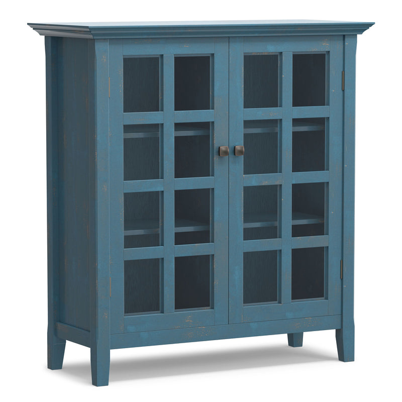 Medium handcrafted Acadian accent storage cabinet by Simpli-Home with wood finish and decorative hardware.