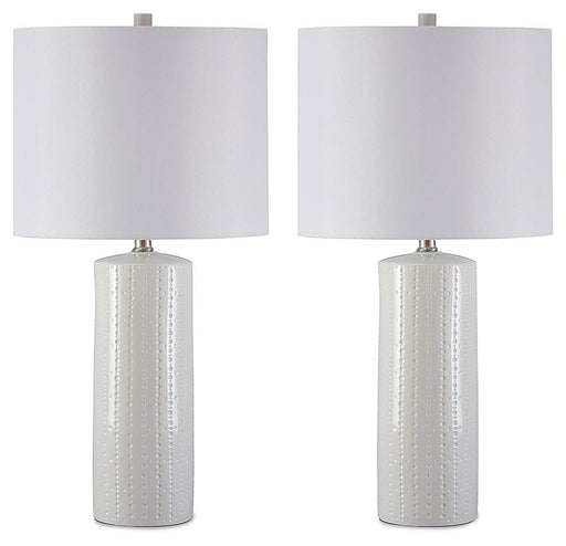 Signature Design by Ashley Steuben table lamp with a sleek base and fabric lampshade, perfect for modern home decor.
