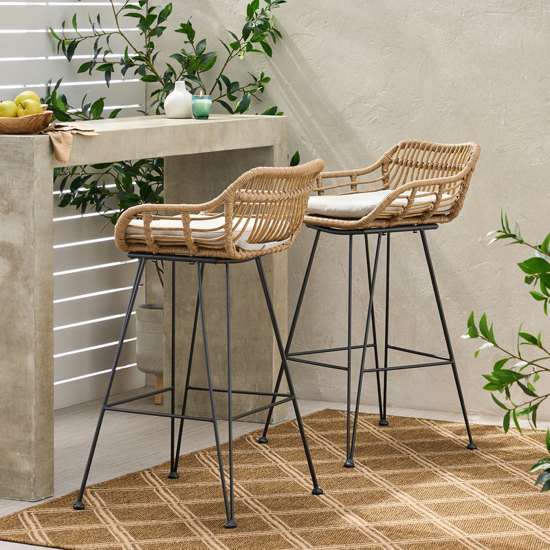 Noble House outdoor rattan bar chair with metal legs, part of stool set, featuring a woven rattan seat and sturdy metal frame.